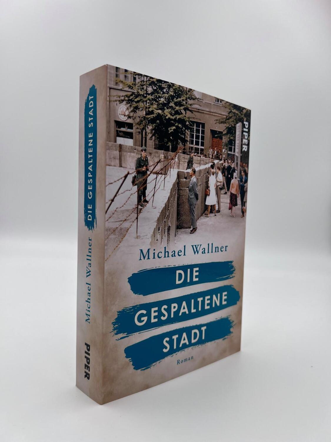 Bild: 9783492063982 | Die gespaltene Stadt | Michael Wallner | Taschenbuch | 384 S. | 2023