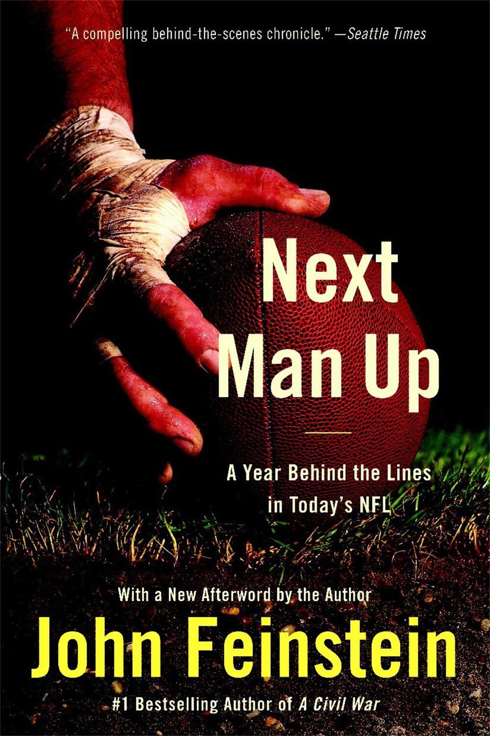 Cover: 9780316013284 | Next Man Up | A Year Behind the Lines in Today's NFL | John Feinstein